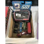 A mixed lot of play worn die cast racing cars, American police car,