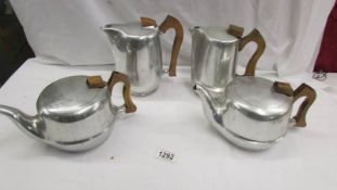 2 Picquot ware teapots and 2 Picquot ware coffee pots.