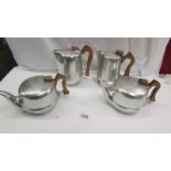 2 Picquot ware teapots and 2 Picquot ware coffee pots.