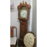An oak 30 hour Grandfather clock.