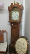 An oak 30 hour Grandfather clock.