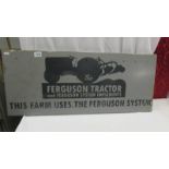 A Ferguson tractor metal sign.