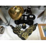A set of kitchen scales with weights & a quantity of horse brasses