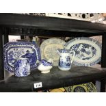 A shelf of blue and white china