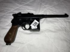 A Mauser metal replica handgun ****Condition report**** Postage to Mainland UK is: