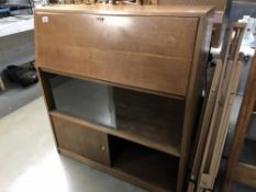 An oak bureau cabinet.