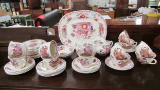 Approximately 35 pieces of dinner and tea ware including 6 Mason's tea cups.