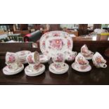 Approximately 35 pieces of dinner and tea ware including 6 Mason's tea cups.