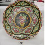 A large hand painted plate.
