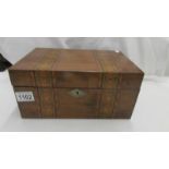 A mahogany inlaid work box.