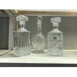 3 glass decanters