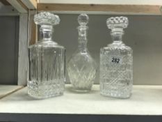 3 glass decanters