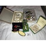 A quantity of costume jewellery including pearls, pill boxes & badge etc.