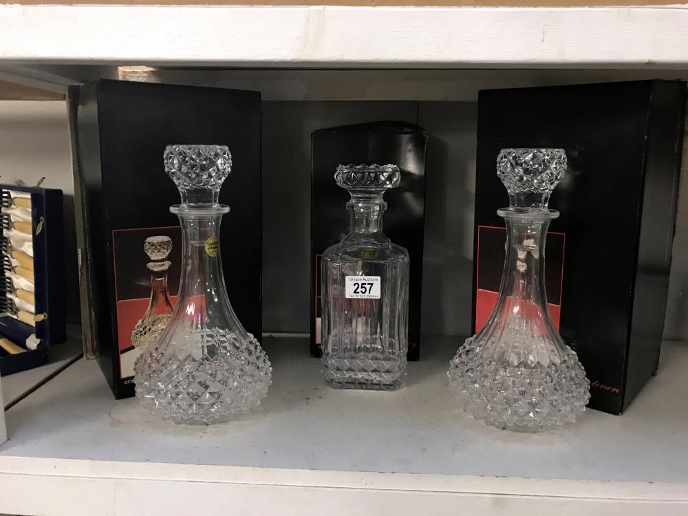 3 boxed cristal D'arques decanters