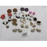 19 pairs of vintage earrings.