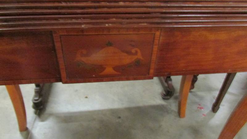 A mahogany fold over tea table with urn inlay. - Image 2 of 2