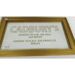 A framed and glazed Cadbury's Makers to HM King and Queen sign.