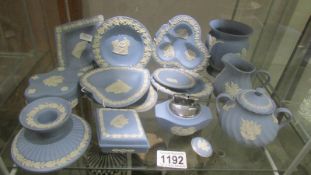14 pieces of Wedgwood blue Jasper ware.