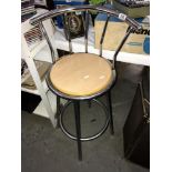 A pair of chrome kitchen stools