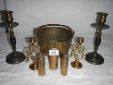 A mixed lot of Victorian and other brass ware including candlesticks, jam pan, gun shells etc.