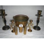 A mixed lot of Victorian and other brass ware including candlesticks, jam pan, gun shells etc.