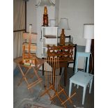 A good lot of assorted wooden items including low tables, folding table, lamps etc.