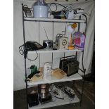 A mixed lot of electric items including can opener, irons, radio, mixer etc.