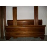 A French Louis Baton solid mahogany bedstead, 6 foot wide and complete.