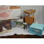 A mixed lot of boxed items including new footwarmer, new kettle.