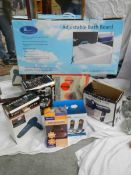 A quantity of boxed hair dryers, bath board etc.