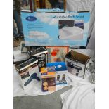 A quantity of boxed hair dryers, bath board etc.