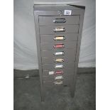 A fine 10 drawer metal cabinet in gun metal grey with key, 72 x 42 x 29 cm.
