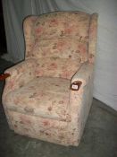 A good mid to late 20th century armchair together with a matching recline/raise armchair,