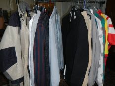 2 rails of vintage and other clothing including jackets, coats, football shirts etc.