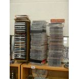 A quantity of CD's and rack.