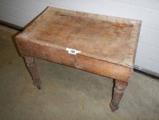 An early 20th century French baby bath in stand.