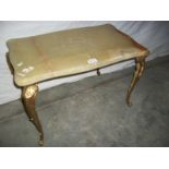 A French style marble topped table on gilded legs, 80 x 38 x 40 cm (marking on top is a seam).