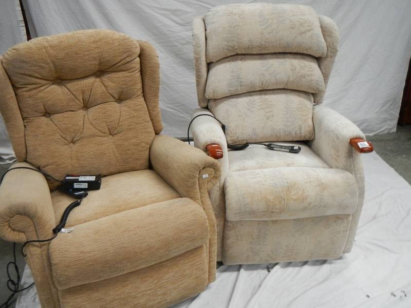 2 Celebrity single reclining chairs with controls. (one in need of recovering).