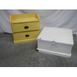 A 2 drawer pine shelf unit in yellow and a pine chest in white.