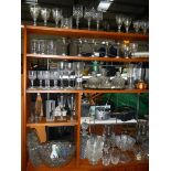 A large lot of assorted glass ware including decanter, Babycham glasses, cut glass etc.