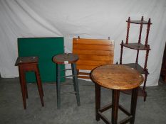 A 4 tier what not (1 m high), a pine topped metal leg stool, and oak round top coffee table,