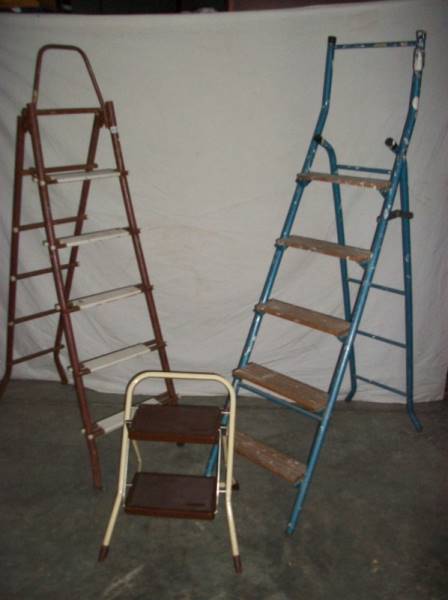 3 metal step ladders, 2 x 3 step and 1 x 2 step.