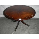 A good circular mahogany table with string inlay, 74 cm diameter.