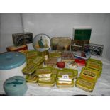 A good mixed lot of old tins including round blue musical powder tin.