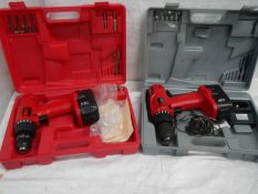 2 cased electric drills (only one charger)