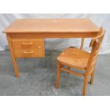 An unusual office desk with 2 drawers, lift up writing slope and chair, 115 x 60 x 72 cm.
