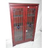 A rosewood veneer leaded glass 3 shelf cabinet, 228 cm high, 30 cm deep and 77 cm wide.