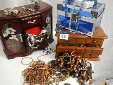A quantity of jewellery boxes and jewellery.