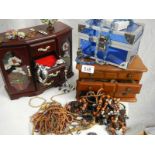 A quantity of jewellery boxes and jewellery.