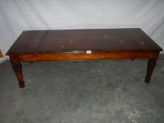 An oak "Long John" coffee table in fine condition, L 75, W 65, H 42 cm.